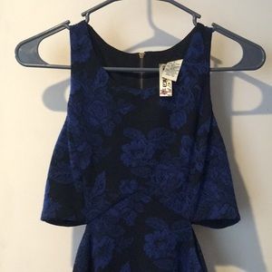 Blue Floral Dress with Side Cut-outs and Pockets!